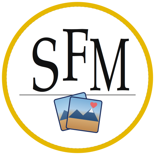 Logo with 'SFM' text and two cards featuring mountain and heart designs, enclosed in a yellow circle.
